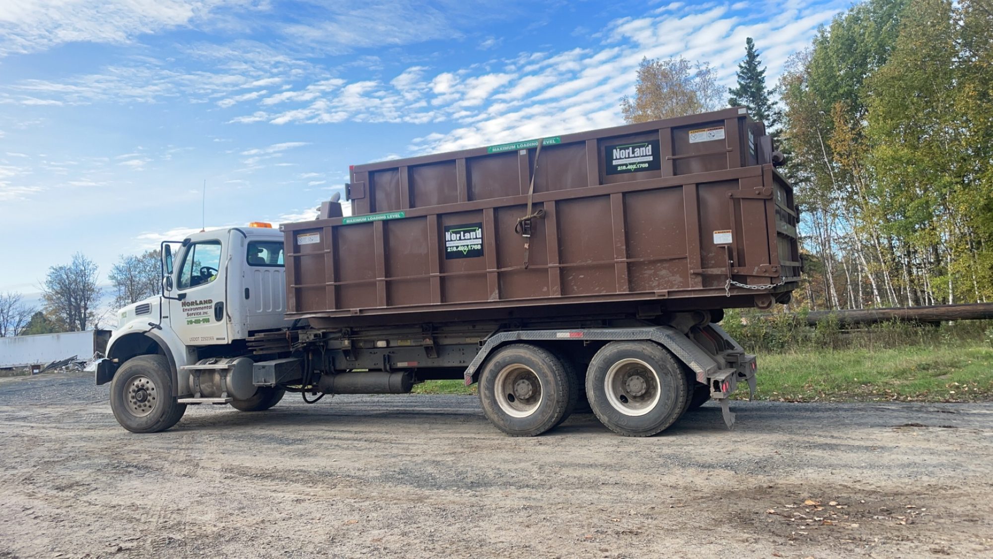 Walter's roll-off dumpster truck
